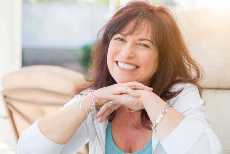 Patient Smiling After Cosmetic Dentistry Veneers Procedure