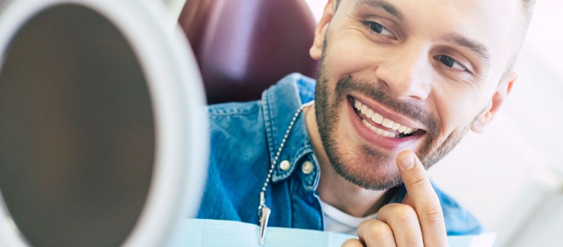 Dental Patient Smiling After Tooth Whitening Procedure