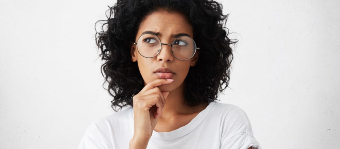Questioning Dental Patient Wondering About Dental Implant Procedures